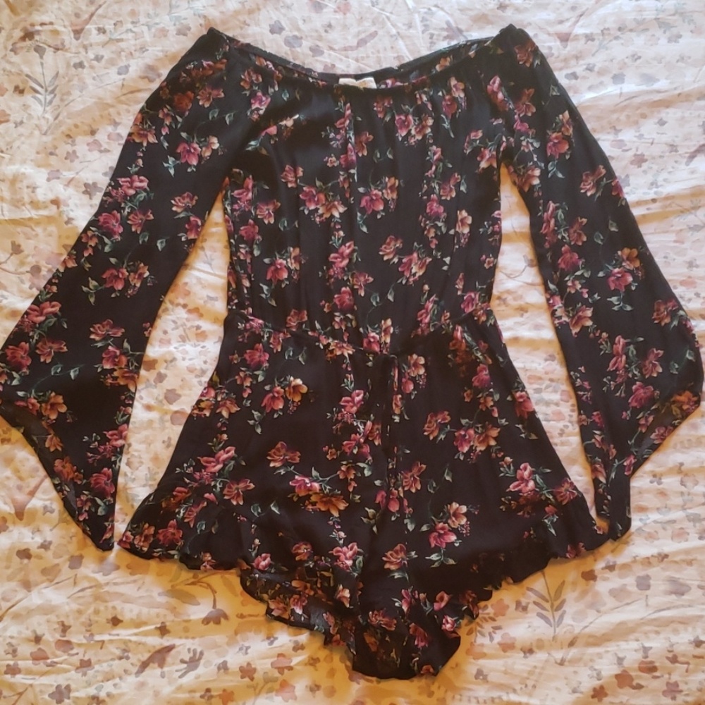Long sleeve, off the shoulder shortie romper.